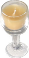 Candle in miniature wine glass yellow