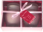 Set of 2 pink candles in glass jar with lid, boxed 