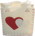 White felt bag with felt handles and red and white hearts
