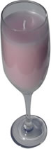 Pink candle in champagne glass