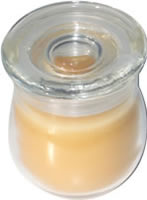 Candle in miniature glass jar with lid yellow