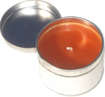 Round orange candle in tin 